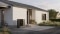The image shows the Vitocal 200-A ie outdoor unit in front of a white single-family home